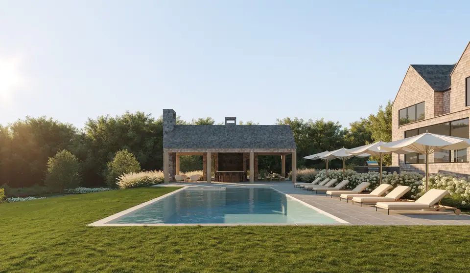 Pool terrace and stone pool pavilion opening onto a meadow